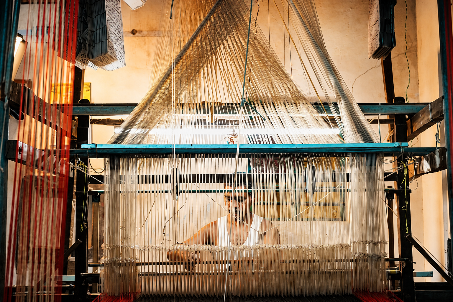 Skilled hands preparing silk thread